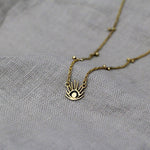 Haul Amulet Pendant made out of fairmined gold vermeil by April March Jewellery, sold by Percy Langley