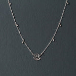 Haul Amulet Pendant made out of recycled silver by April March Jewellery, sold by Percy Langley 