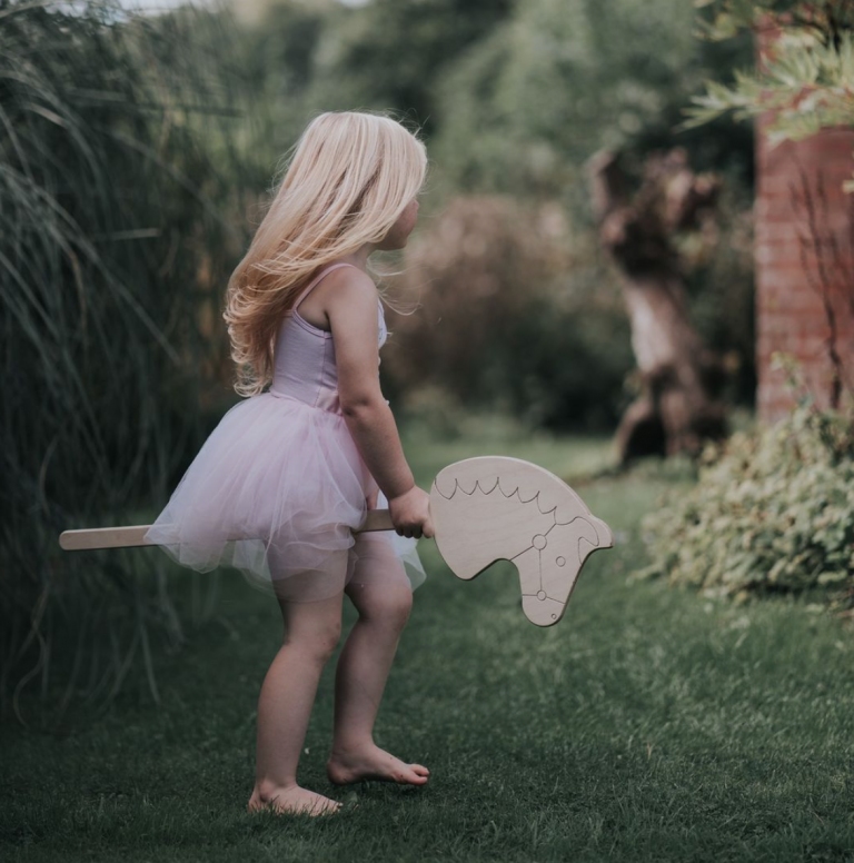 Wooden Hobby Horse by Pursuit of Adventures.  Made from Eco birch Ply. Great for play inside and out. Children will enjoy hours of play with this wonderful toy.
