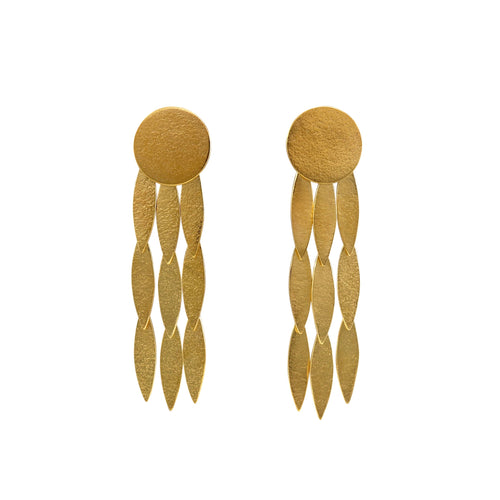 The Icarus Large Sun Drop Earrings are a contemporary statement earring with fantastic movement that shimmer in the light. The are made from Gold vermeil and measure 1.6cm x 6cm  Cara Tonkin designs beautiful, elegant and bold jewellery for stylish and strong-minded women. Her work marries classic and contemporary design to create unique, timeless pieces.   Note that this item is shipped directly from Cara Tonkin