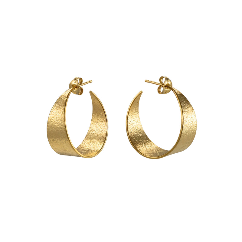Make a statement in these Icarus Medium Sized Hoop Earrings. The earrings are a contemporary take on the traditional hoop earring, made from textured sterling silver finished in gold vermeil.  Dimensions: these hoops measure 1cm x 2.5cm.