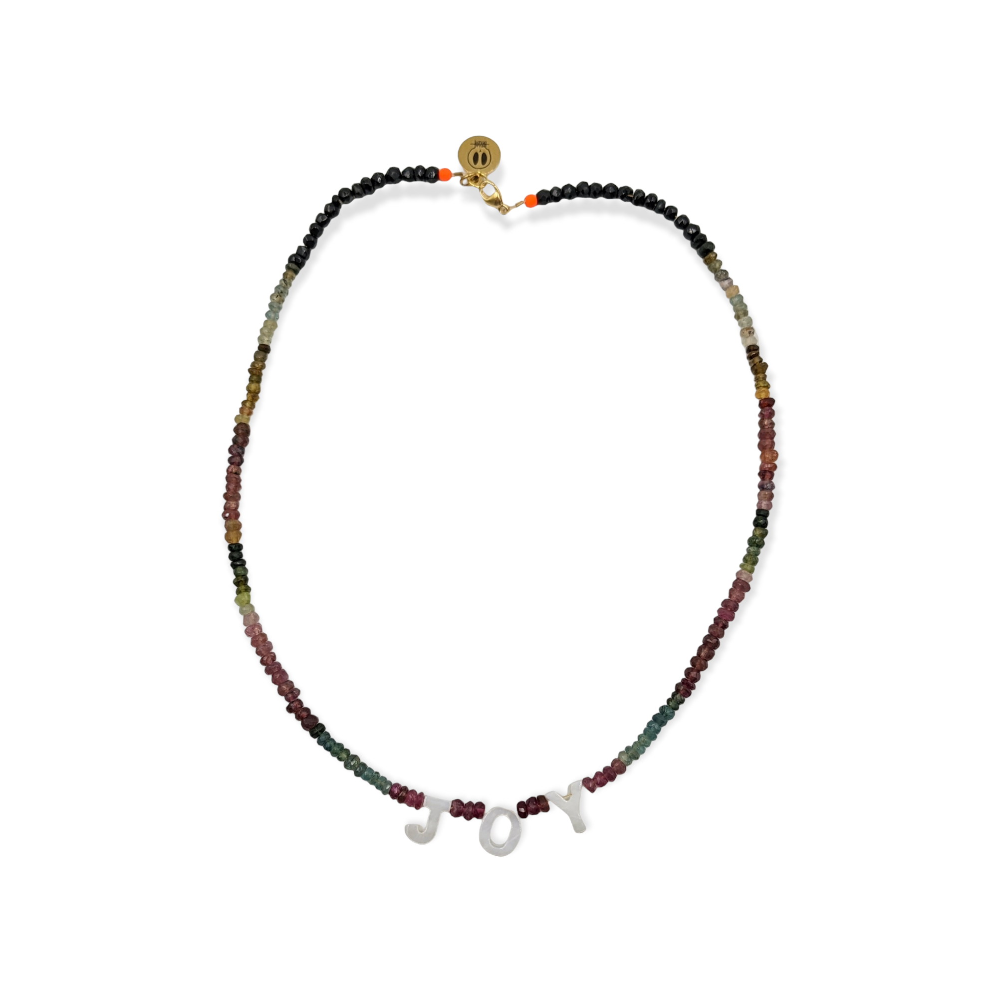 The Tourmaline Word Up necklace by Bella Riley. Exclusive to Percy Langley.  Handmade in Hackney by jeweller Bella Riley, maker of joyful Demi-fine jewellery. Bella’s designs beautifully balance classic and edgy.  Tourmaline beads in a rainbow of colours with mother of pearl letters.  Necklace is 17 inches and is finished with gold-plated clasp lined with signature neon beads and Bella Riley tag.