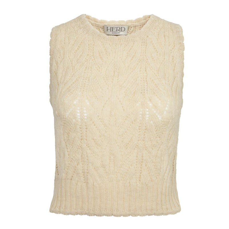The Wyre vest is a beautifully  crafted piece of knitwear that works with everything. Perfect paired with a crisp white shirt or layered slip dress, with jeans or a tweed skirt. This is a wear everywhere investment piece that looks as good worn for work as it does for a lunch date or layered over a dress on colder days.