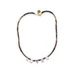The Tourmaline Word Up necklace by Bella Riley. Exclusive to Percy Langley.  Handmade in Hackney by jeweller Bella Riley, maker of joyful Demi-fine jewellery. Bella’s designs beautifully balance classic and edgy.  Tourmaline beads in a rainbow of colours with mother of pearl letters.  Necklace is 17 inches and is finished with gold-plated clasp lined with signature neon beads and Bella Riley tag.