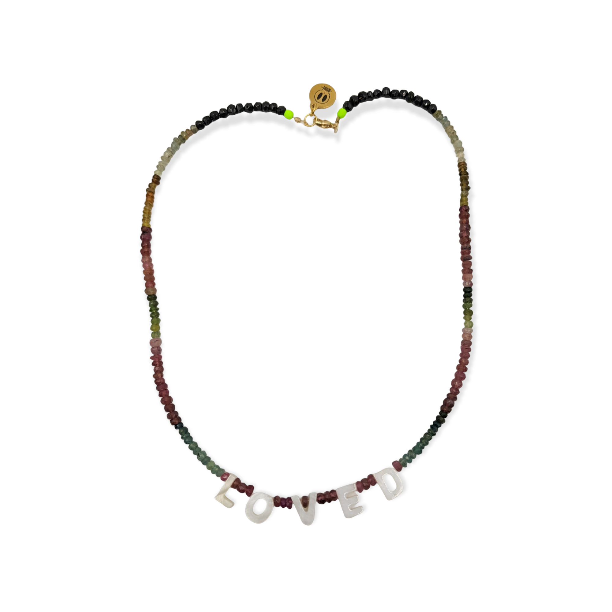 The Tourmaline Word Up necklace by Bella Riley. Exclusive to Percy Langley.  Handmade in Hackney by jeweller Bella Riley, maker of joyful Demi-fine jewellery. Bella’s designs beautifully balance classic and edgy.  Tourmaline beads in a rainbow of colours with mother of pearl letters.  Necklace is 17 inches and is finished with gold-plated clasp lined with signature neon beads and Bella Riley tag.