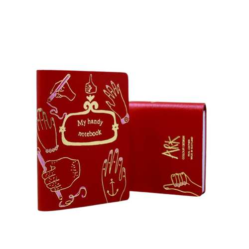 Deep red foil embossed A5 leather bound journal. With plain white pages inside  A handy notebook to have to hand.  Handmade in Scotland.  Dimensions: 7.5cm x 9.7cm