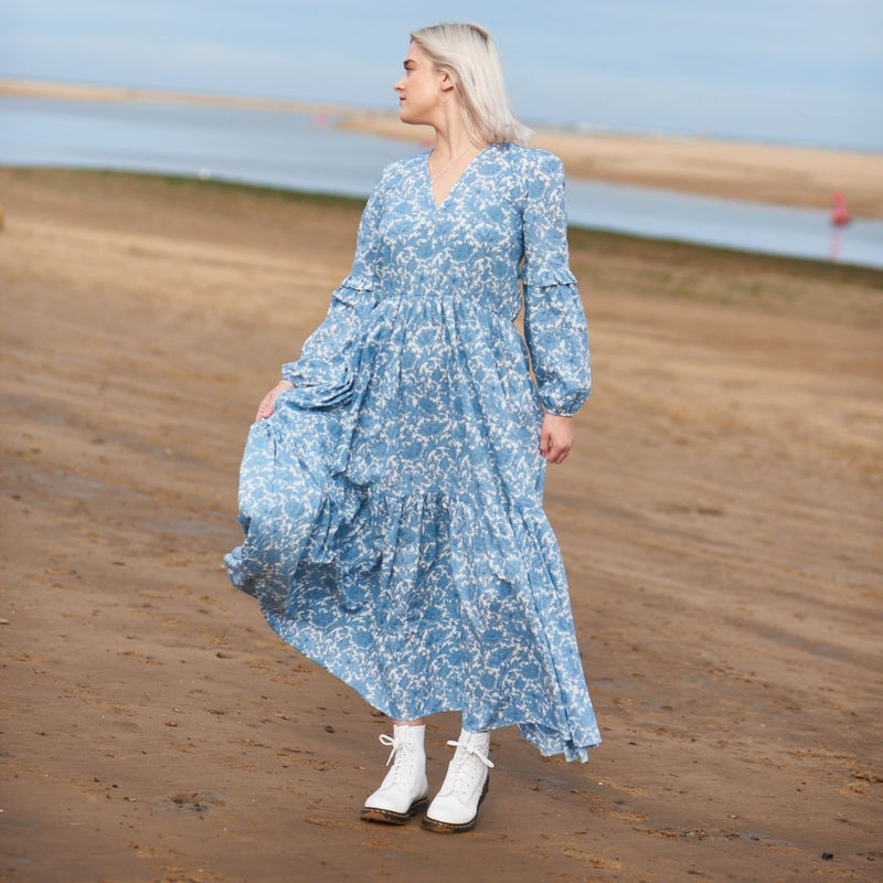 The May Morris dress is a super flattering vee neck, ankle skimming maxi dress with a cinched waist and pockets. The long sleeves are slim through the upper arm and have a slight bell at the wrist. The elasticated waist is designed to be worn with or without a belt. The belt supplied is in the matching fabric; alternatively our reversible kimono belts can be bought separately and feature contrasting fabrics. 