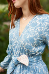 The May Morris dress is a super flattering vee neck, ankle skimming maxi dress with a cinched waist and pockets. The long sleeves are slim through the upper arm and have a slight bell at the wrist. The elasticated waist is designed to be worn with or without a belt. The belt supplied is in the matching fabric; alternatively our reversible kimono belts can be bought separately and feature contrasting fabrics. 
