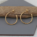 Medium textured hoops made out of fairmined gold vermeil by April March Jewellery, sold by Percy Langley