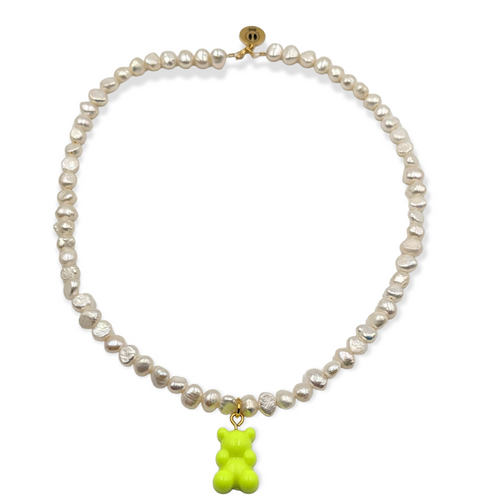 Neon Gummy & Freshwater Pearls Necklace by Bella Riley. Exclusive to Percy Langley.  Handmade in Hackney by jeweller Bella Riley, maker of joyful Demi-fine jewellery. Bella’s designs beautifully balance classic and edgy.  A string of freshwater nugget pearls with neon yellow gummy bear.  Necklace is 17 inches and is finished with gold-plated clasp lined with signature neon beads and Bella Riley tag.