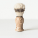 A lovely and entirely natural brush made from beechwood and natural bristles that will soften with use and create a luxurious lather for a gentle and massaging shave, by Percy Langley