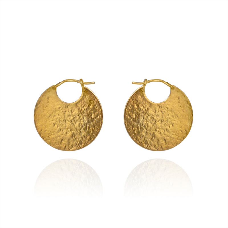 Gold Vermeil Paillette Disc Hoop Earrings are a contemporary take on the classic hoop earring with a minimal aesthetic. The earrings are made of sterling silver with a gold vermeil finish.   Dimensions: 2.5cm in diameter. 