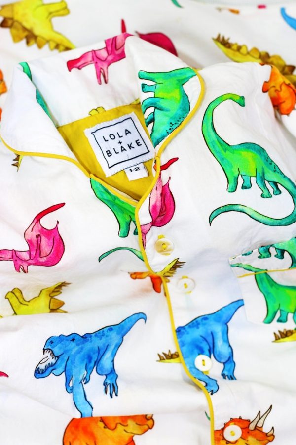 These vibrantly hand illustrated colourful dinosaur pyjamas are a favourite for kids, by Percy Langley