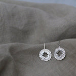 Star Amulet Earrings made out of recycled silver by April March Jewellery, sold by Percy Langley