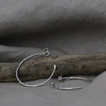 Large textured hoops made out of recycled silver by April March Jewellery, sold by Percy Langley