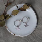 Textured shape earrings with a rhombus tag made out of recycled silver by April March Jewellery, sold by Percy Langley