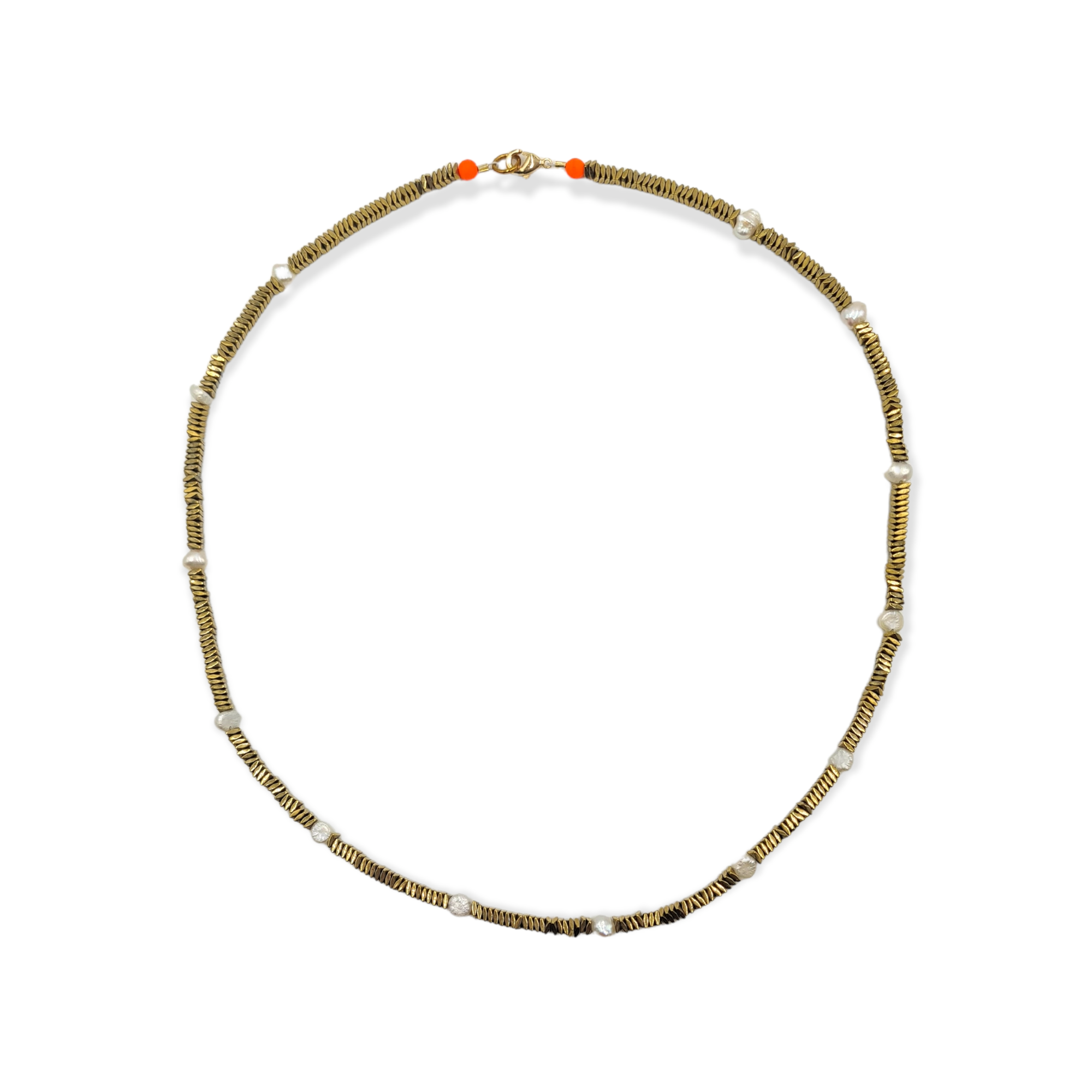 The Gold Hematite & Pearl Spacer necklace by Bella Riley. Exclusive to Percy Langley. Handmade in Hackney by jeweller Bella Riley, maker of joyful Demi-fine jewellery. Bella’s designs beautifully balance classic and edgy. Gold hematite beads with freshwater nugget pearl spacers. Shimmers and move beautifully replicating a traditional gold chain. Finished with gold-plated clasp lined with the signature Bella Riley neon glass beads.