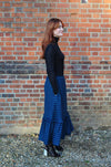 women wearing tartan skirt